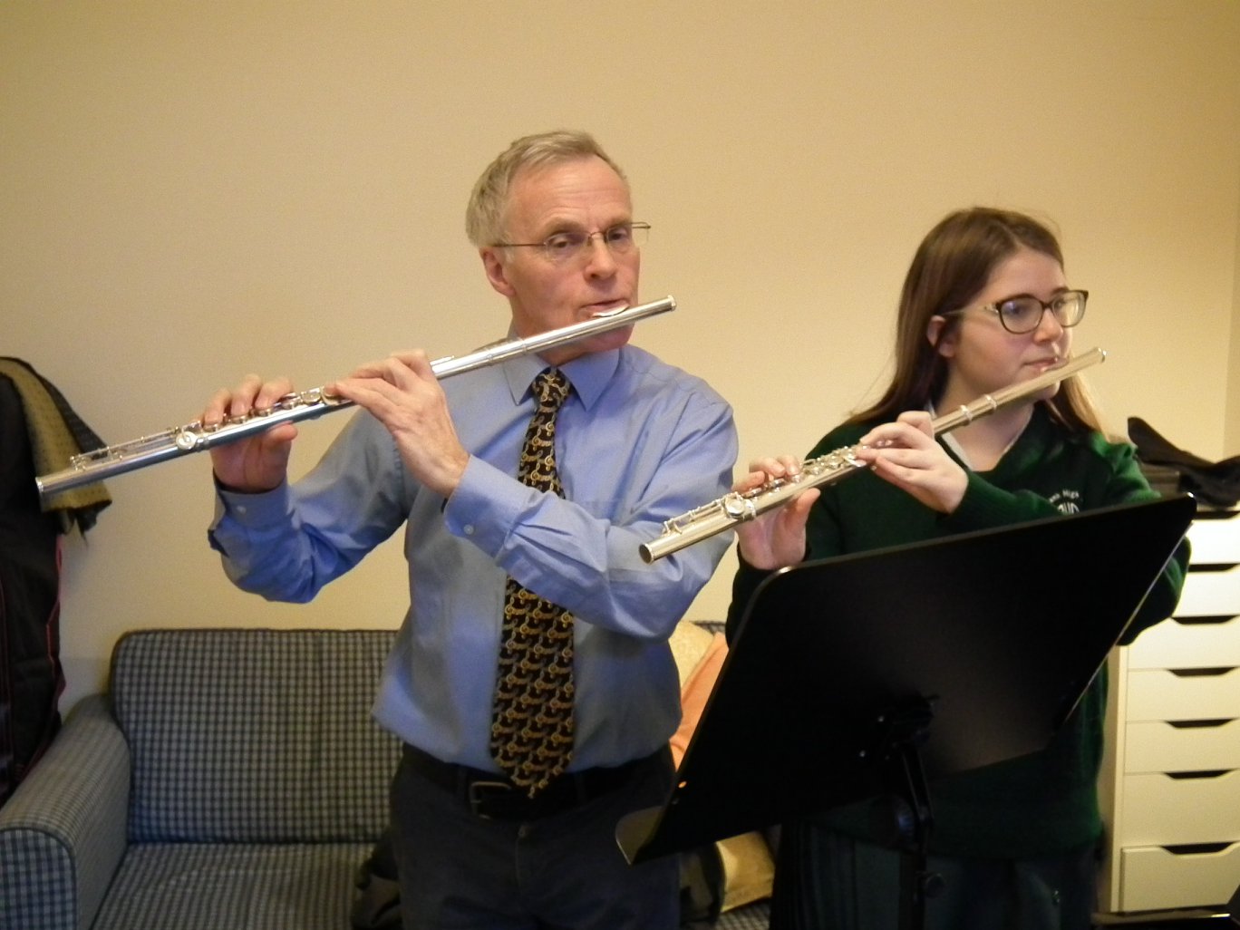 Woodwind Musician giving Flute Lesson